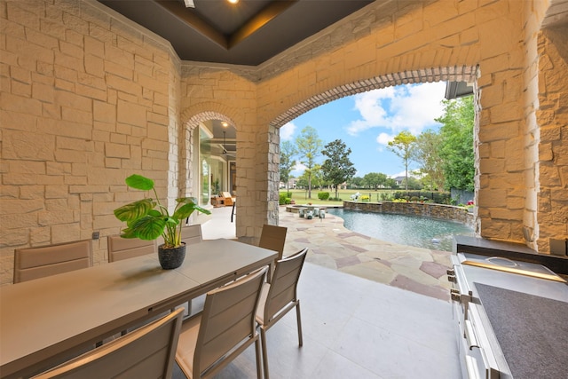 view of patio featuring pool water feature