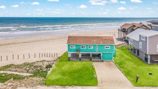 bird's eye view with a water view and a view of the beach