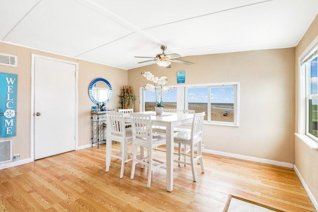 dining space with plenty of natural light, visible vents, and light wood-style floors