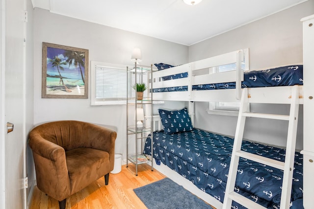 bedroom with hardwood / wood-style flooring