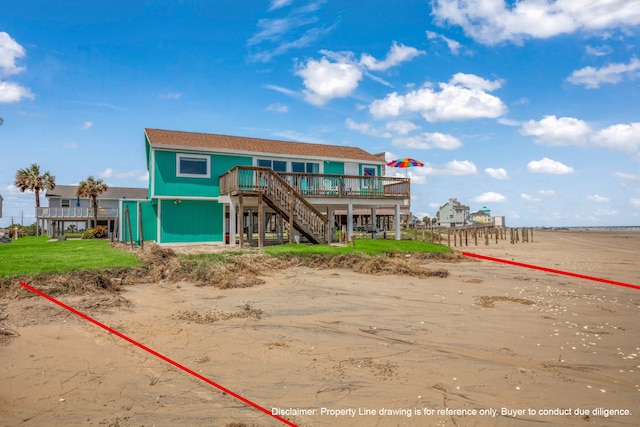 back of property featuring a wooden deck