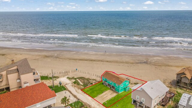 aerial view with a view of the beach and a water view