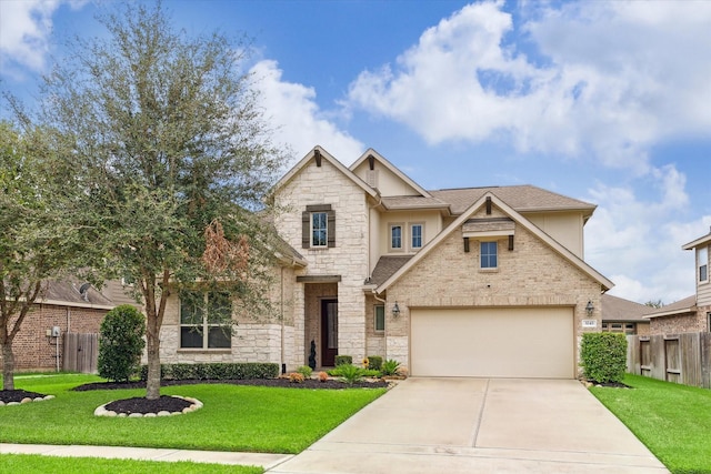 craftsman inspired home with a garage and a front yard