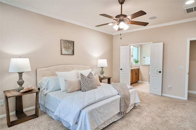 bedroom with light carpet, ensuite bath, ceiling fan, and ornamental molding