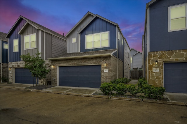 view of front of home with a garage