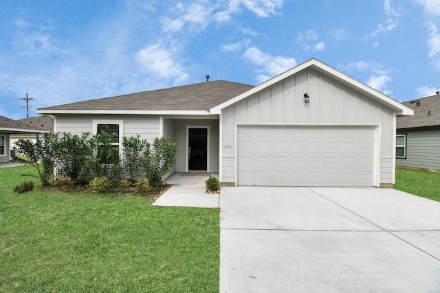 ranch-style house featuring a garage and a front yard