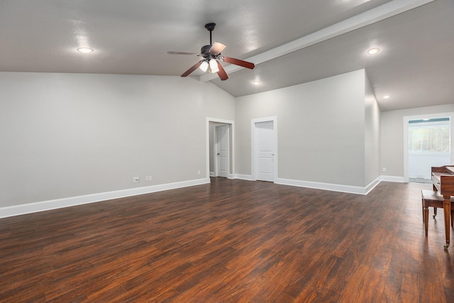 unfurnished room featuring lofted ceiling with beams, dark hardwood / wood-style floors, and ceiling fan