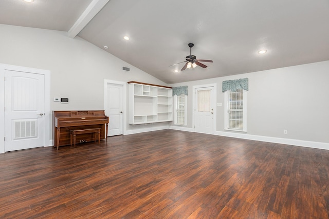 unfurnished living room with beamed ceiling, dark hardwood / wood-style floors, high vaulted ceiling, and ceiling fan