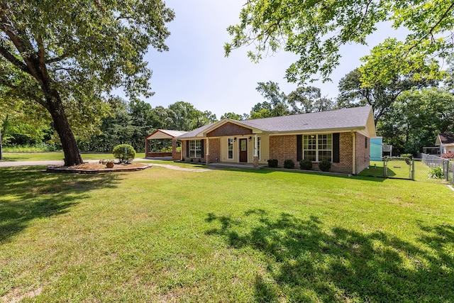 single story home featuring a front lawn