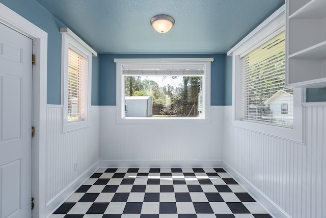 empty room with a textured ceiling