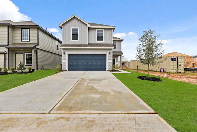 front facade with a front yard and a garage