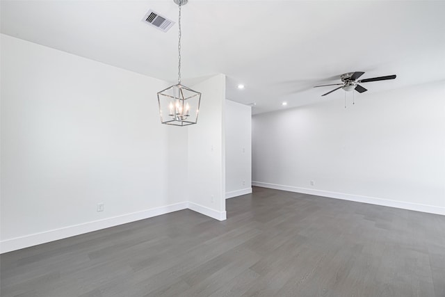 8211 Gladstone St, Houston, TX 77051 - spare room featuring a chandelier, recessed lighting, dark wood finished floors, and a ceiling fan