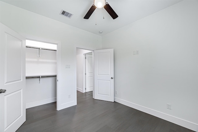 8211 Gladstone St, Houston, TX 77051 - unfurnished bedroom with dark wood-style floors, a closet, and a ceiling fan