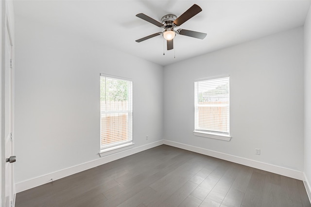 8211 Gladstone St, Houston, TX 77051 - spare room with plenty of natural light, dark wood-style flooring, and ceiling fan