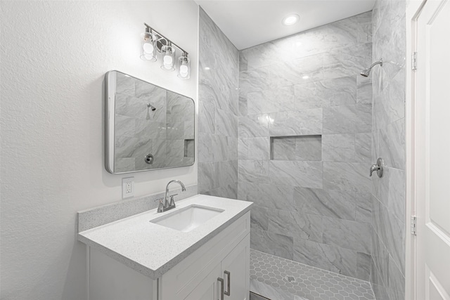 8211 Gladstone St, Houston, TX 77051 - full bathroom with tiled shower, vanity, and recessed lighting