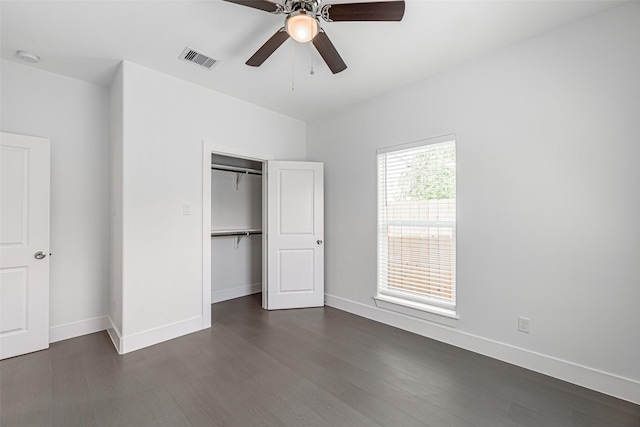 8211 Gladstone St, Houston, TX 77051 - unfurnished bedroom with dark wood finished floors, a closet, and ceiling fan
