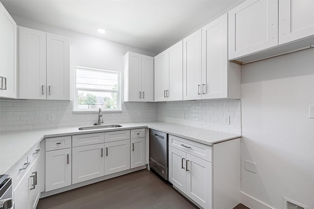 8211 Gladstone St, Houston, TX 77051 - kitchen with dishwasher, white cabinets, backsplash, and recessed lighting