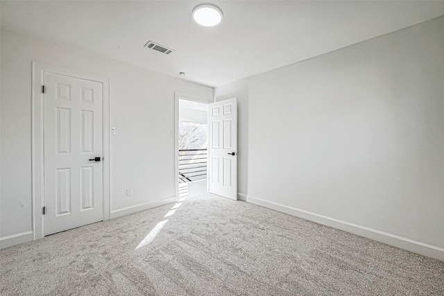 unfurnished room featuring carpet floors