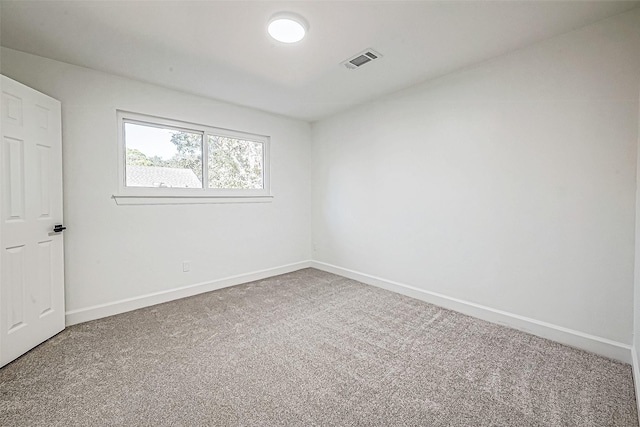 empty room featuring carpet