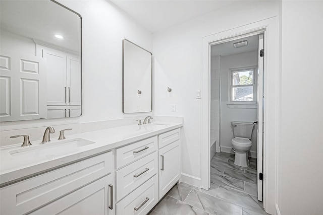 bathroom with vanity and toilet