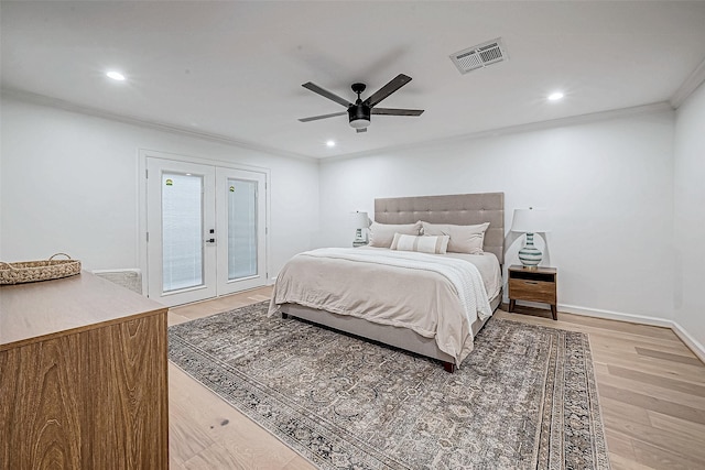 bedroom with hardwood / wood-style floors, french doors, crown molding, ceiling fan, and access to exterior