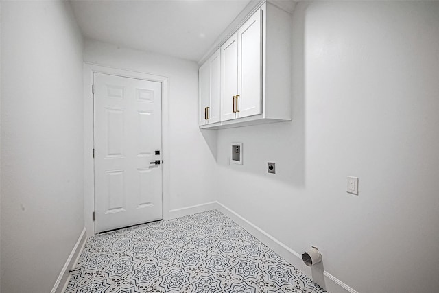 clothes washing area with electric dryer hookup, cabinets, and hookup for a washing machine