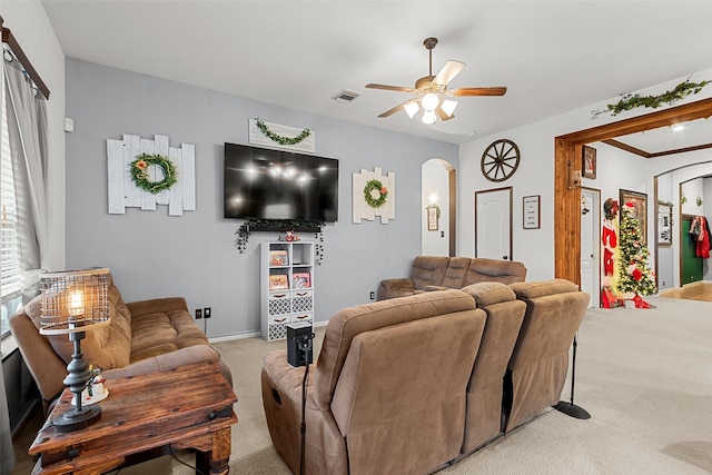 living room with light carpet and ceiling fan