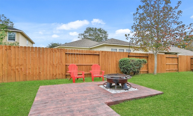 view of patio featuring a fire pit