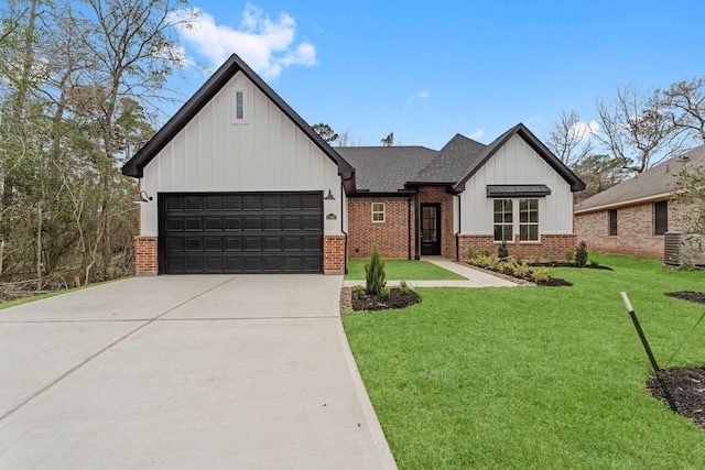 modern inspired farmhouse featuring a garage and a front lawn