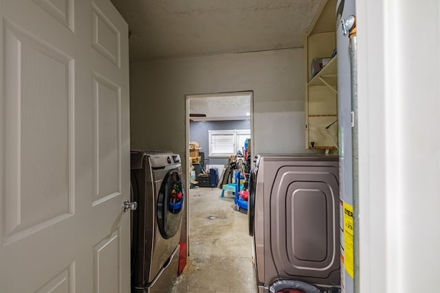 laundry room with washing machine and dryer