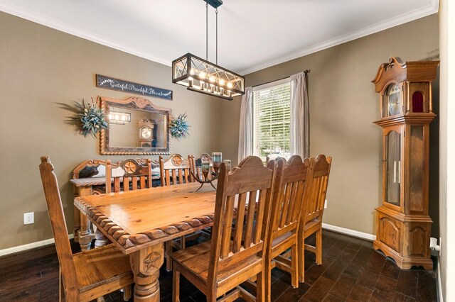 dining space featuring ornamental molding and dark wood-type flooring