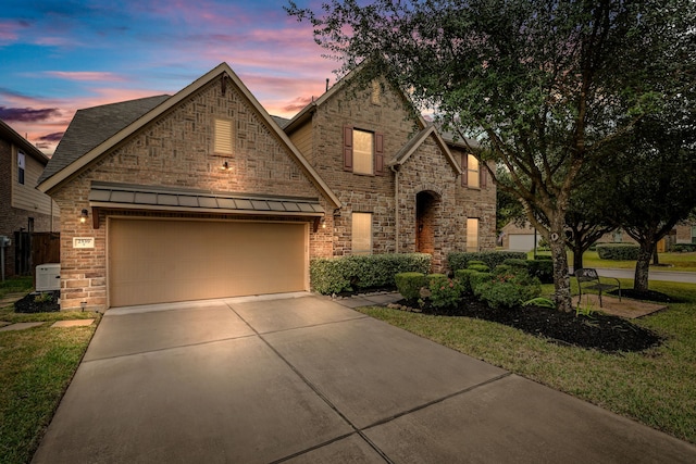 view of front of property with a garage