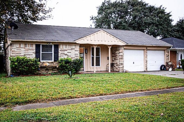 ranch-style home with a garage and a front lawn