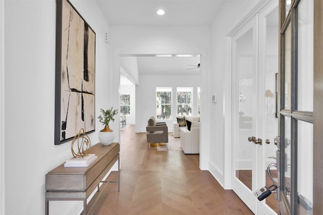 hallway with french doors and parquet floors