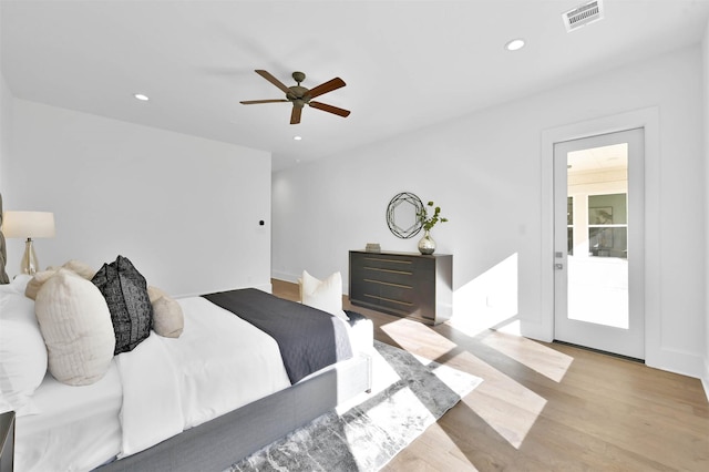 bedroom featuring ceiling fan and light hardwood / wood-style flooring