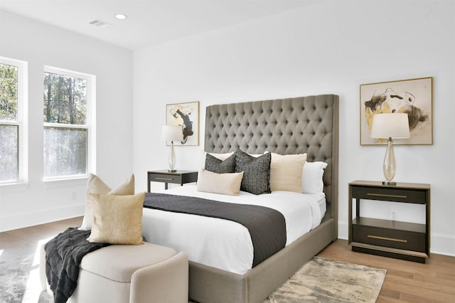 bedroom featuring light hardwood / wood-style flooring