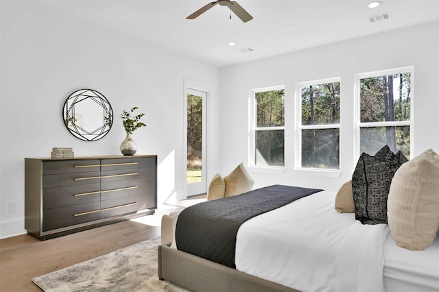 bedroom featuring ceiling fan and light wood-type flooring