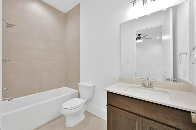 full bathroom featuring tile patterned floors, vanity, tiled shower / bath combo, ceiling fan, and toilet