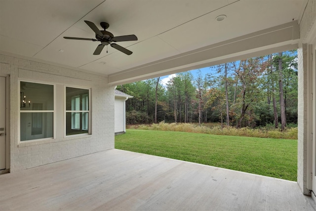 view of patio featuring ceiling fan