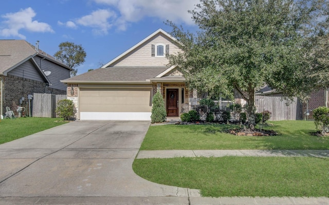 view of front facade featuring a front yard and a garage