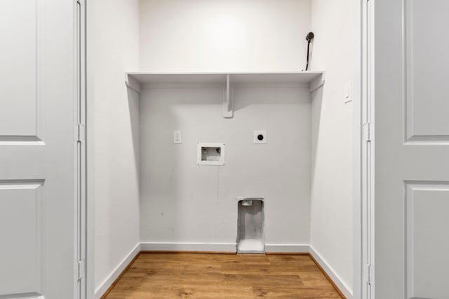 laundry area featuring hookup for an electric dryer, washer hookup, and light wood-type flooring