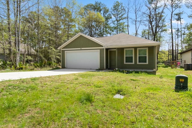 view of front of property with a garage and a front lawn