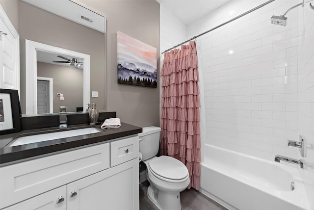 full bathroom featuring shower / bath combination with curtain, vanity, toilet, and ceiling fan