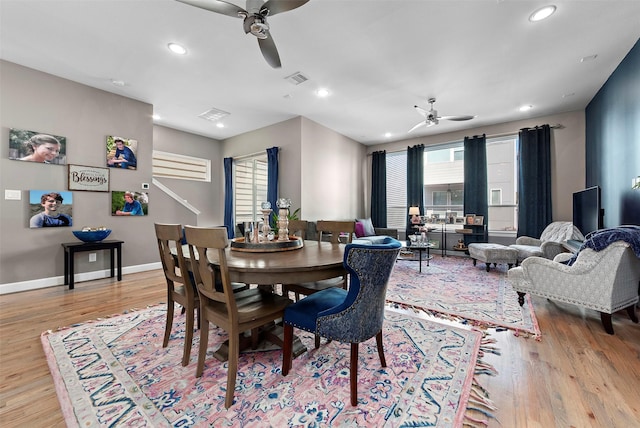 dining room featuring ceiling fan and light hardwood / wood-style flooring