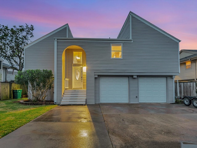 24 N Omega St, La Marque, TX 77568 - view of front facade featuring a garage