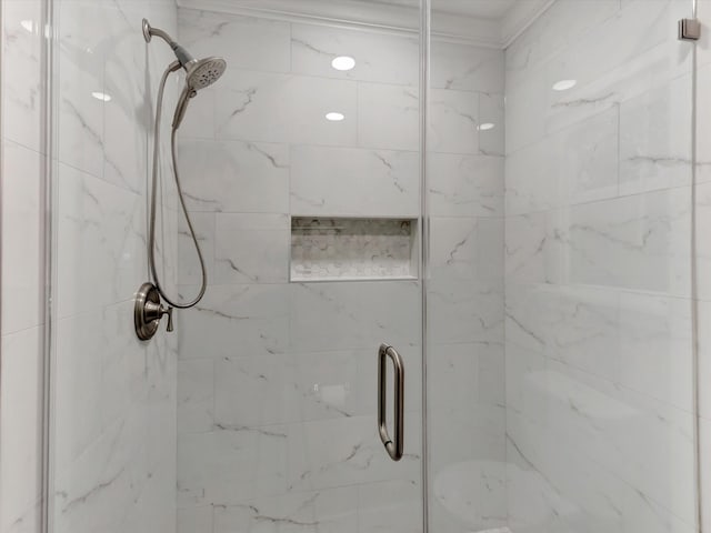 24 N Omega St, La Marque, TX 77568 - bathroom featuring an enclosed shower
