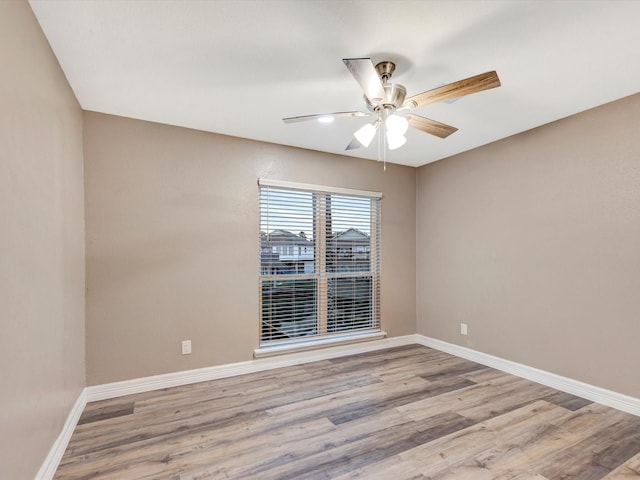 24 N Omega St, La Marque, TX 77568 - unfurnished room with ceiling fan and light wood-type flooring