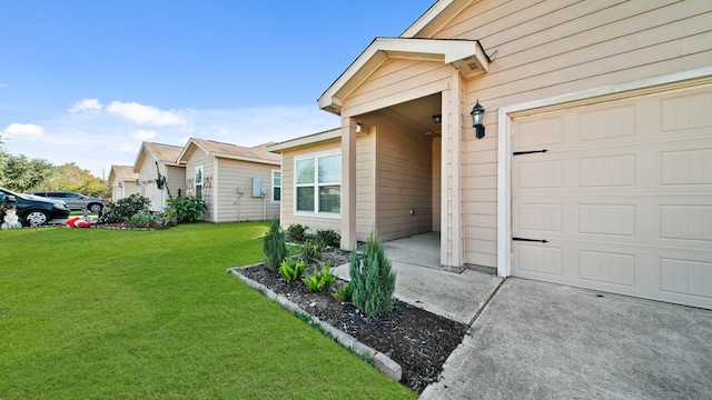 doorway to property with a yard