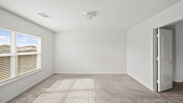 empty room with carpet floors