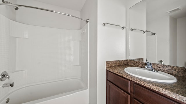 bathroom featuring vanity and shower / washtub combination